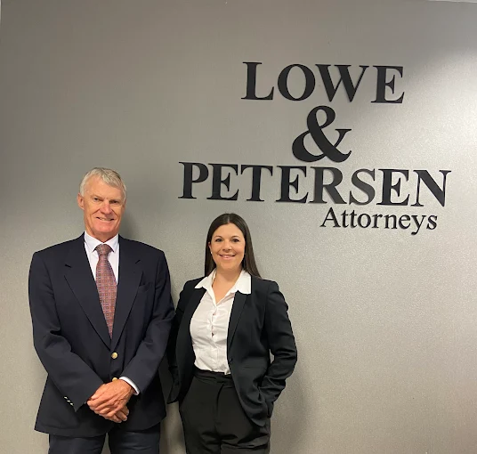 Brian Lowe and Megan Castle at Lowe & Petersen Attorneys Cape Town office